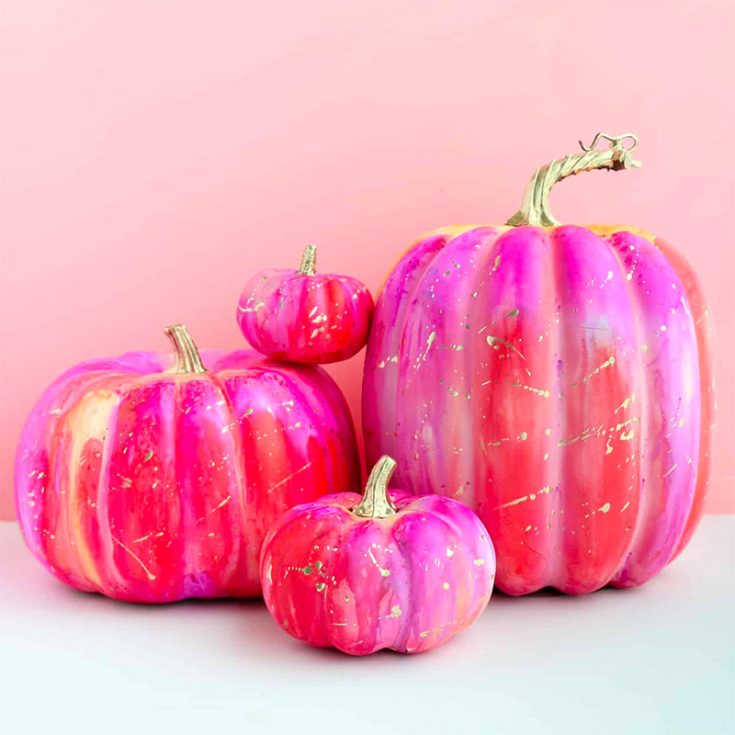 A cross between marbling and paint dripping, using alcohol ink on your painted pumpkin ideas will create the most beautiful results. These psychedelic pumpkins work best with fake pumpkins.