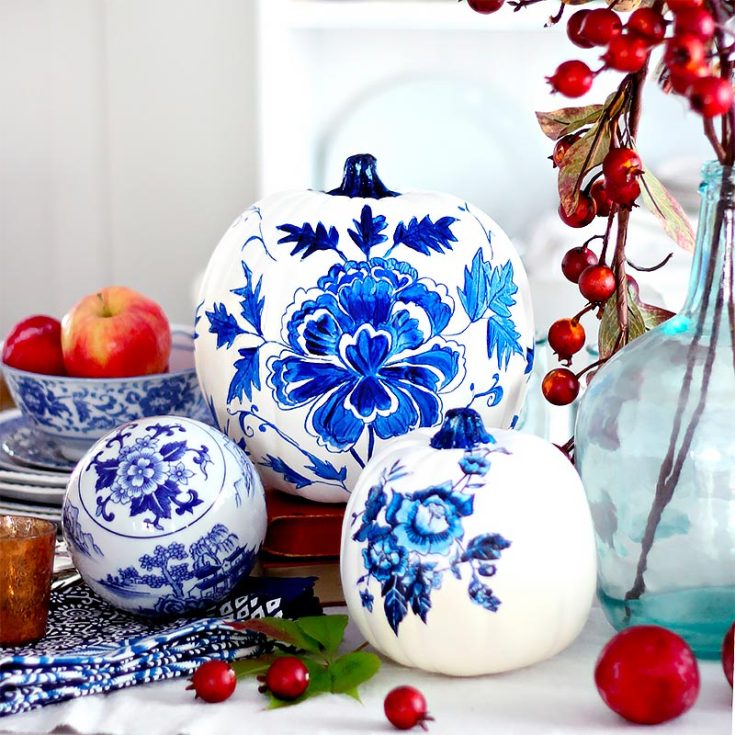 Aren't these blue porcelain pumpkin painting ideas gorgeous? The contrast of the fall colors with the blue makes this pumpkin stand in the limelight. It may take some time, but follow this tutorial thoroughly for breathtaking results.