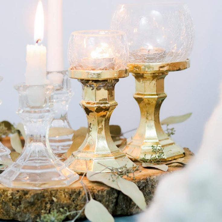 These candle holders with a golden metallic finish are sure to be admired by your guests during dinner. They won&rsquo;t even be able to tell you crafted them with items from the dollar store. Check out the other dollar store diy crafts by Lily Ardor on her website!