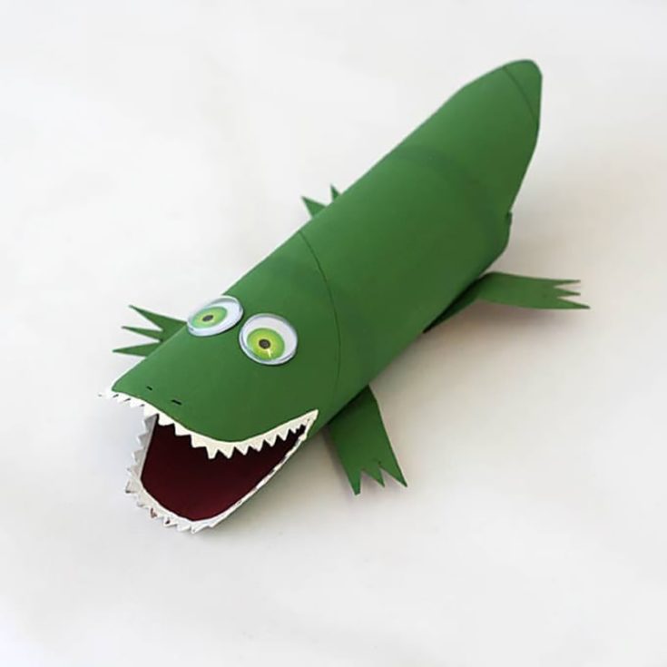 Snap into crafting fun with this cardboard tube alligator! Paint the paper roll green and add paper or foam teeth along the edges. Add this fun craft project when teaching kids about the letter A, talking about the rainforest or swamps, or if they are learning about zoo animals.