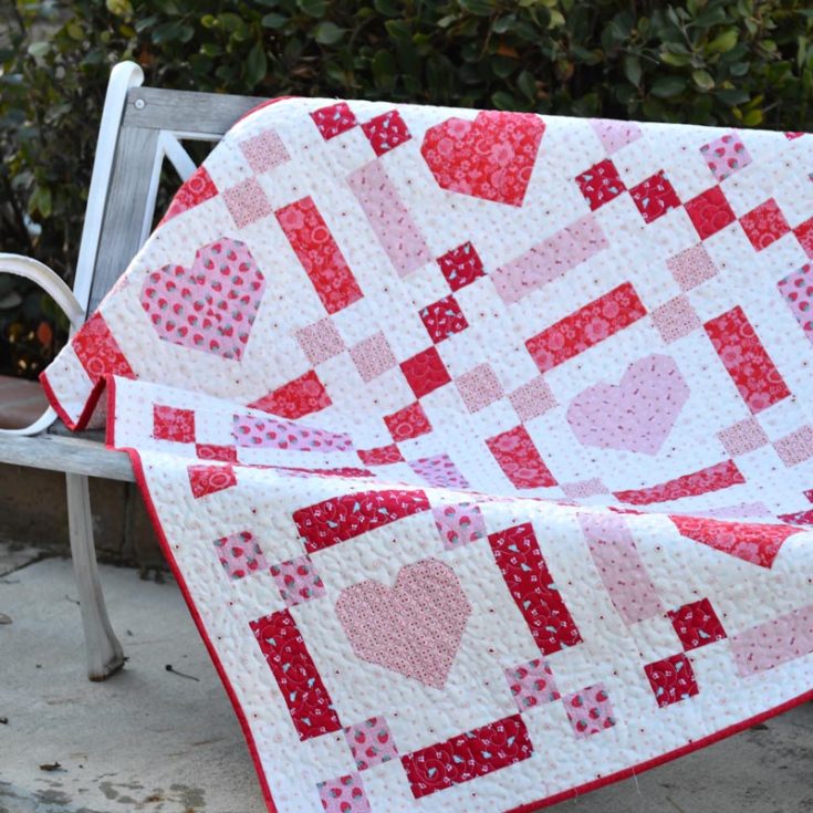 Whether you're making it for your partner, your mom, or Valentine's Day, this quilt will have you falling head over heels! It's such a gorgeous and lovely design that is made from 5 fat quarters. The finished size is 50" x 50", with an Irish chain style and pieced hearts in the center. Isn't it adorable?&nbsp;