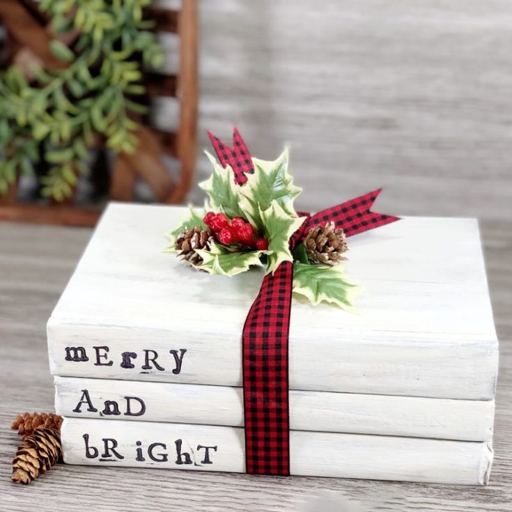Buying Christmas decor can get pretty repetitive and overused after a couple years. Why not add a simple festive touch to your home with these DIY Dollar Tree Christmas book stacks. They can be easily made to fit any decor or style in your home.