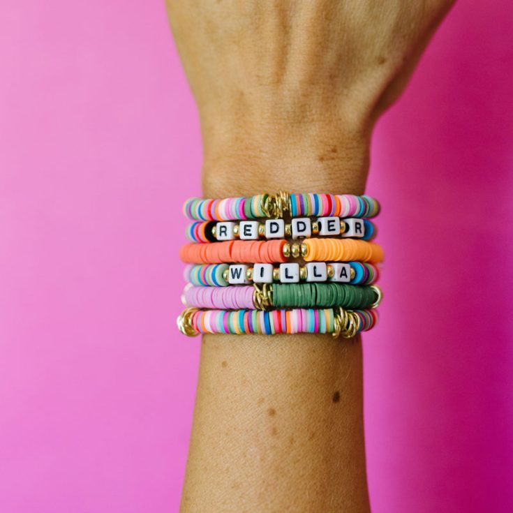 Learn to make a DIY clay bead bracelet with this tutorial! They're so fun to make, perfect for kids and adults. Pair it with letter beads to spell out your name, or decorate it with gold accents to make it extra personalized.