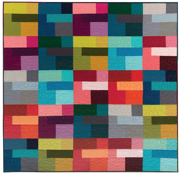 This unique quilt pattern from Robert Kaufman reminds me of modern art, It's repeating yet contrasting color blocks sewn side-by-side like the works of Andy Warhol. You could try this pattern out if you're experimenting with color combinations or even just different shades of the same color!