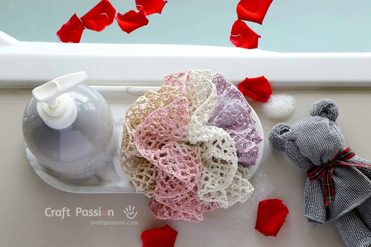 crochet bath pouf DIY your own shower scrubbie with this easy, beginner-friendly crochet loofah pattern. Great as a washcloth or bath pouf for everyday use or gifts!