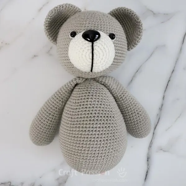 how to attach arms to the crochet bear
