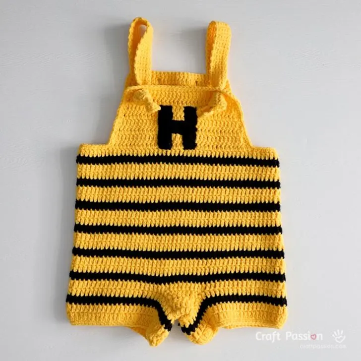 Adorable bee romper crochet pattern for babies! Free crochet pattern with photo tutorial. Part of the bee costume set with matching hat and wings.