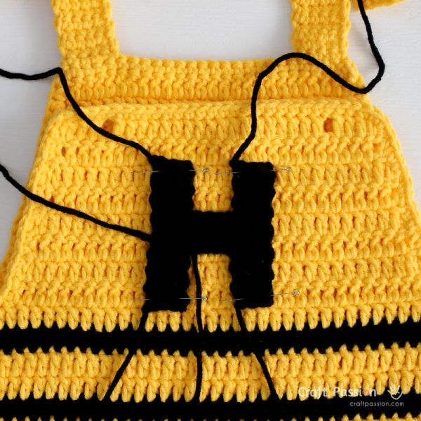 Add a letter “H” applique for a charming personalized detail and completes the playful Honey Bee theme.