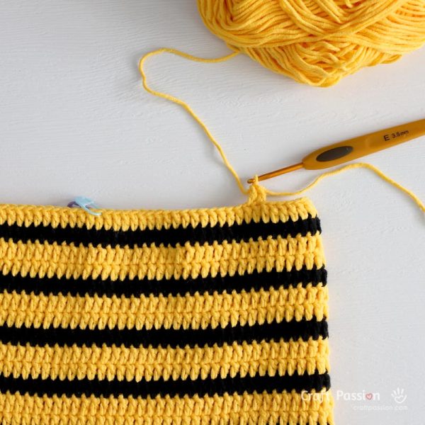 Crochet the front and back bib for a bee romper.
