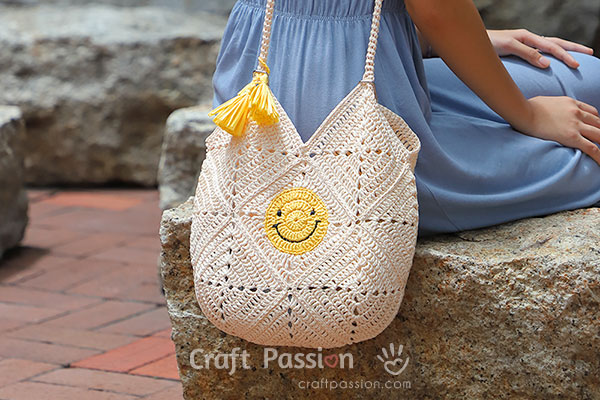 crochet granny square bag with smiley granny squares