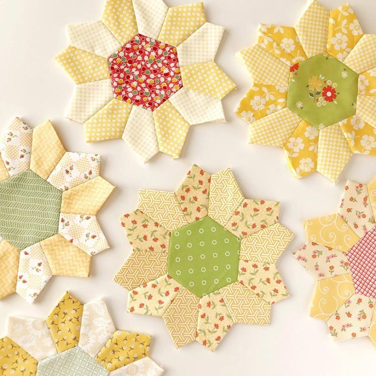 All of the flowers are pieced together using English paper piecing techniques. The petals of each flower are made up of two different prints, with a contrasting print in the center. Depending on your sewing theme, you can also make your Dhalia Flowers with rainbow-colored&nbsp;fabrics.
