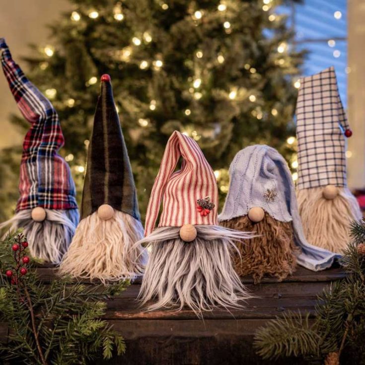 These Christmas gnomes rock a cozy pajama look, with hats made from patterned socks on top of bean bag bodies. Their laid-back style makes them perfect for holiday decor or a sweet, handmade gift!