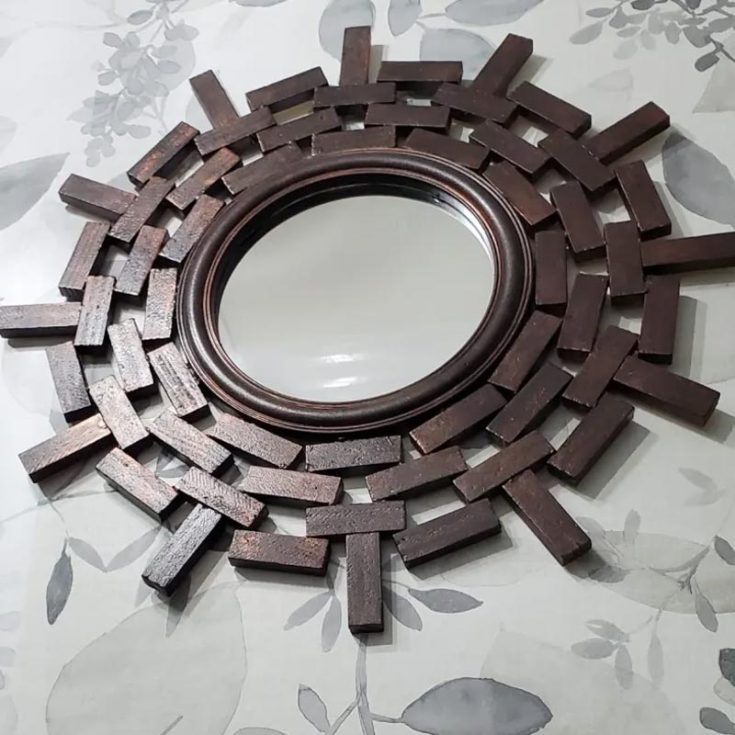 You can&rsquo;t find mirrors like this just anywhere! You would have to grab some wooden blocks from the dollar store to start crafting this one-of-a-kind mirror decor. This Jenga Block mirror would be a fun evening craft as you would have to meticulously arrange the blocks symmetrically to achieve a stylish and modern flair.