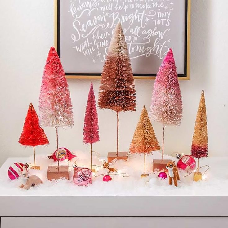 Ombre is a shade of color or gradient moving from light to dark. Why not apply that to some trees that will make a nice decoration? This is one of the more colorful Christmas decoration ideas. Learn to make some in the tutorial below to spice up your place!