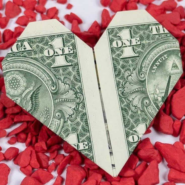 Have you ever wondered how to fold a dollar into a heart? This tutorial will be your guide to making one! With detailed instructions, you can fold this simple dollar heart in no time.