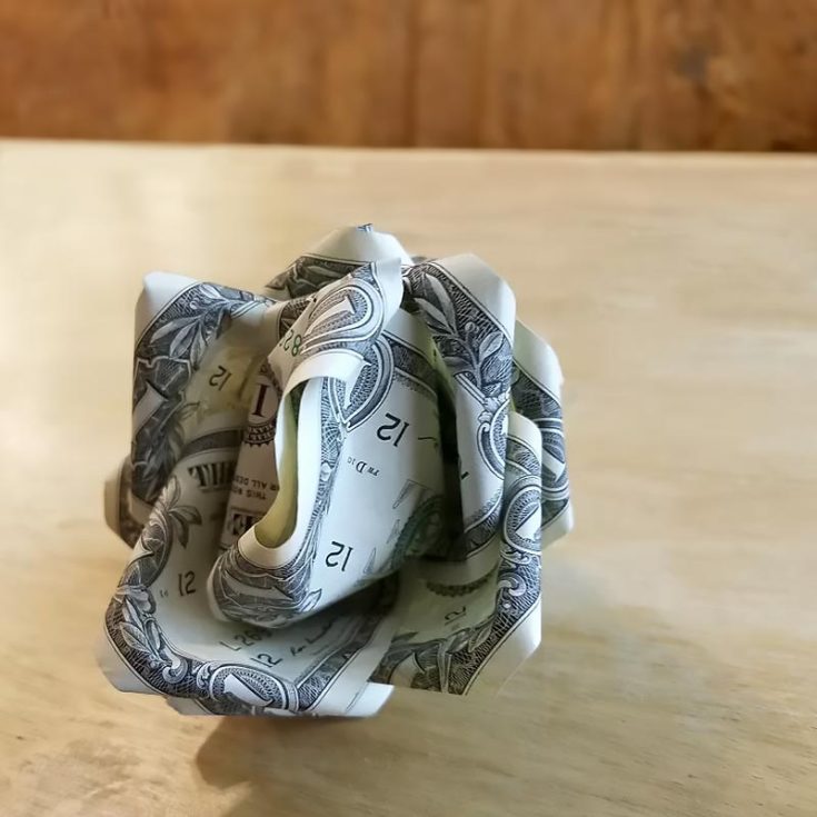 Want to pair the origami hearts with something else? Why not add a dollar origami rose to the list? With all these lovely crafts you've made, your recipient is bound to be on cloud nine!