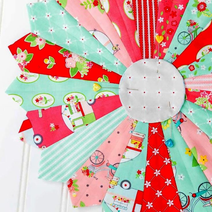 Here's a Dresden plate quilt block tutorial from Coral+Co. Sewing a Dresden plate may seem intimidating due to the many Dresden petal blocks, but once you've got the hang of it, this project will be a breeze. You may need a Dresden plate ruler and a bamboo pointer for this block pattern.