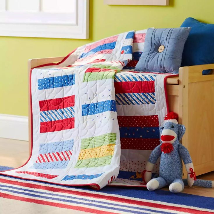 Like its name, this quilt design is as easy as 1-2-3! It uses jelly roll strips to create colorful rectangle shapes on the design, giving it a cute flair for a baby quilt. Whether to put in a nursery or gift it to your friend&rsquo;s baby shower, this quilt will be a keepsake and treasured for years to come. The finished size is 46 &frac12;&rdquo; x 50 &frac12;&rdquo;.
