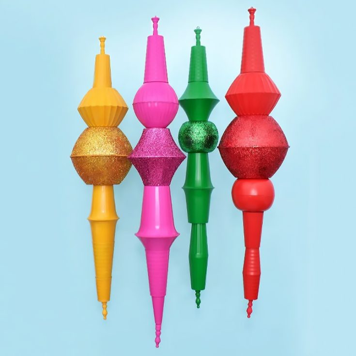 A finial is a distinctive section of a building usually at the apex of a building. It gives a unique look to the entire structure. So if you are looking to make your tree looking unique, try this out!