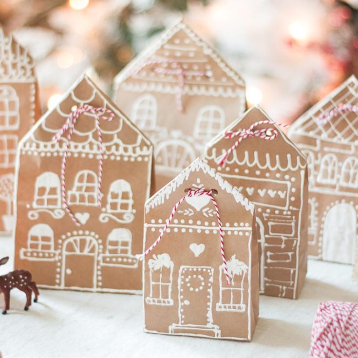 Turn basic brown paper bags into cute gingerbread houses with just a little white paint. They&rsquo;re the perfect way to wrap up holiday cookies. Plus, it&rsquo;s fun to imagine little gingerbread men living inside, spreading holiday cheer!