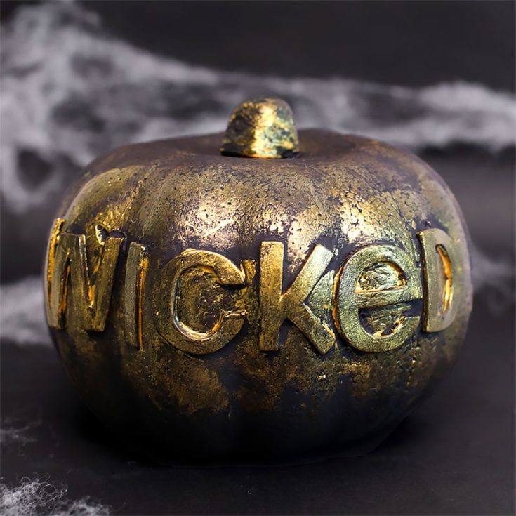 We're back with scary pumpkin painting ideas for Halloween with this black word pumpkin with a weathered metallic glaze. This pumpkin looks like it belongs in a witch's tavern. Follow the tutorial to see how to create this spooky design!