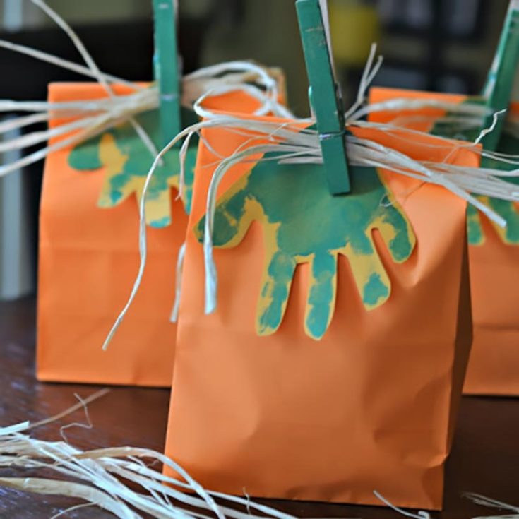 Trick-or-treat in style with some customizable pumpkin gift bags. Let your children dip their hands into the paint as they splatter it onto the bag! It adds such a personal touch to the craft! Not to mention, it is a great bonding experience.