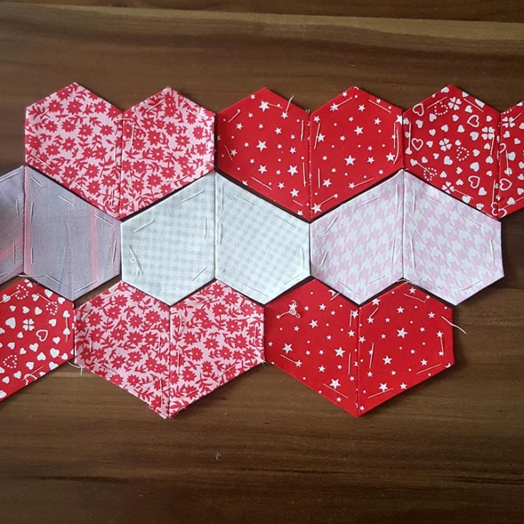 These sweet English paper-picked&nbsp;hearts would be great for any Valentine's Day craft. Two jewel EPP pieces are sewn together to form a heart. This is one of the simplest EPP projects, ideal for beginners.