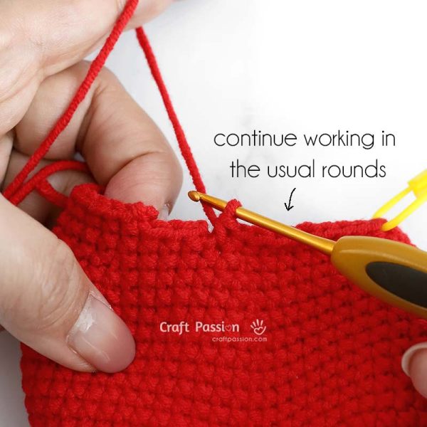 Crocheting the short-row stitches to shape the curvy tail