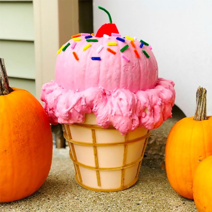 If you're going bright, colorful, and happy for your Halloween decorations, you cannot miss out on this giant ice cream cone pumpkin. Your visitors won't ever be able to tell this was a pumpkin!