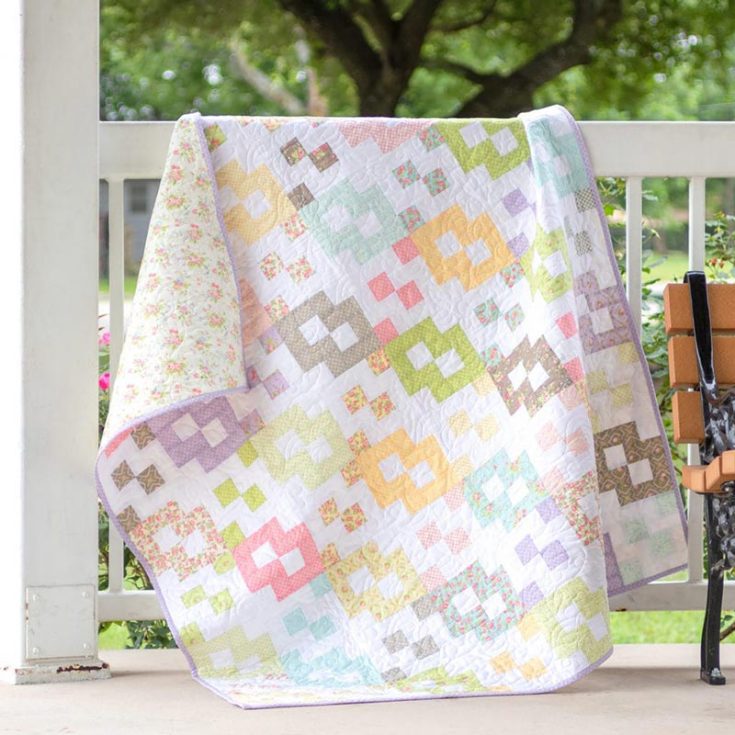 If you&rsquo;re looking for soft-colored quilts that are soothing to the eyes, this layer cake link pattern is right up your alley! It incorporates the beautiful Finnegan fabric collection by Brenda Riddle that captures the soft glam of this quilt. It&rsquo;s ideal for quilters of all levels and even provides a video tutorial to help guide you. The finished size of this quilt is 56 &frac12;&rdquo; x 63 &frac12;&rdquo;.