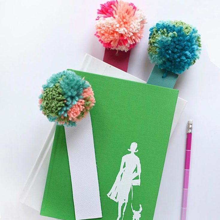 Mix up some fun textures to get this exciting leather pom-pom bookmark! Using strings and leather, the two materials harmonize to create something unique and playful for your reading escapades.