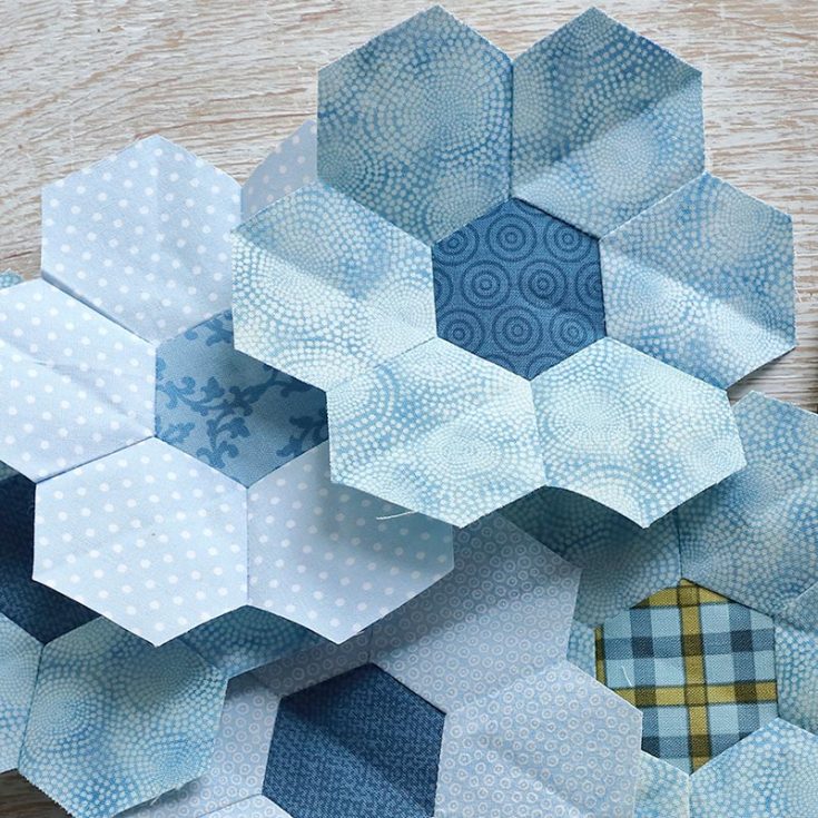 Don't you love how sweet these hexagon flower quilt blocks look? Piecing together many of these can be quite a hassle, so we've brainstormed a technique for you to make these real quick! With practice, you would be able to sew eight of these in under an hour! Once you've gathered a stack of these, make yourself this beautiful Hexagon Flower quilt duvet cover!
