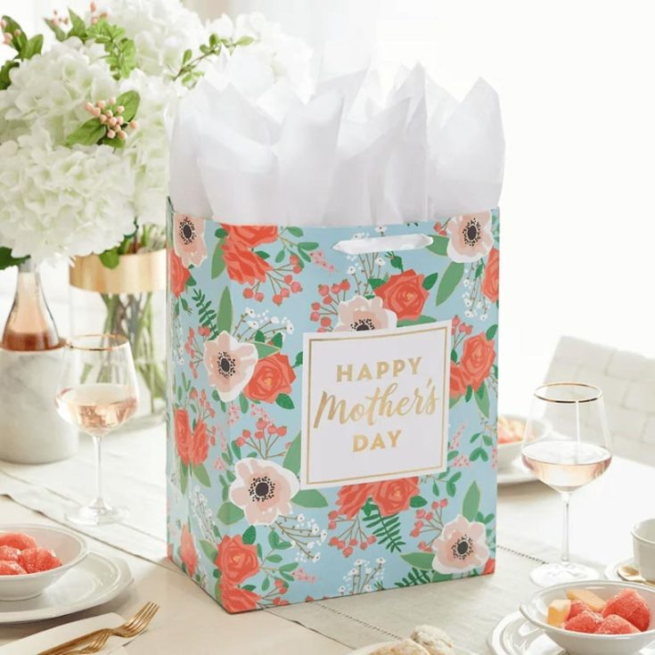 Make a sweet Mother&rsquo;s Day box frame gift bag using pretty wrapping paper and a label for that extra touch! Plus, you&rsquo;ll find 14 fun and trendy ways to decorate gift bags in this article, if you&rsquo;re looking to add your own personal flair.