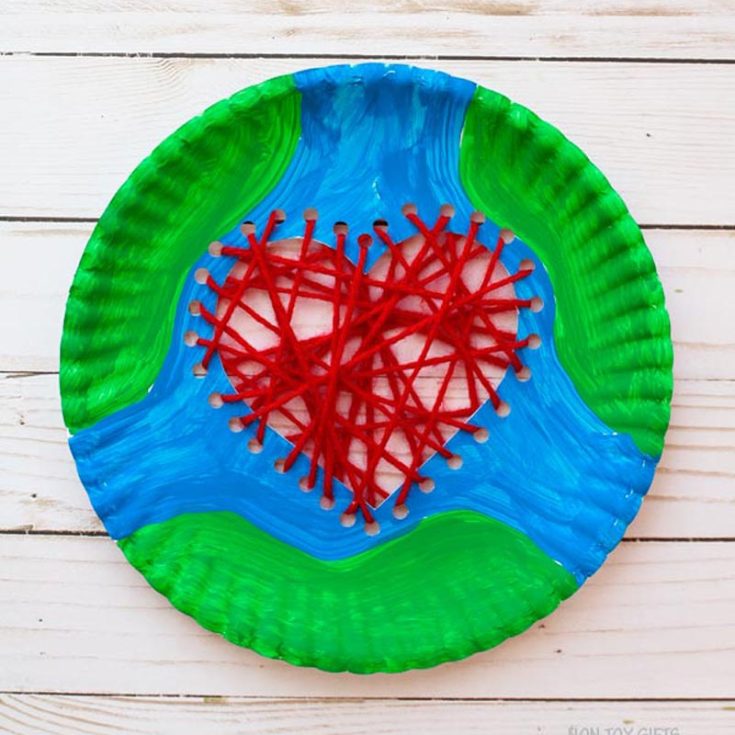 If you have some leftover red yarn from our T-shirt yarn craft, you can make this adorable and simple paper plate craft with your little ones. Turn ordinary paper plates into a symbol of our affection for the planet.