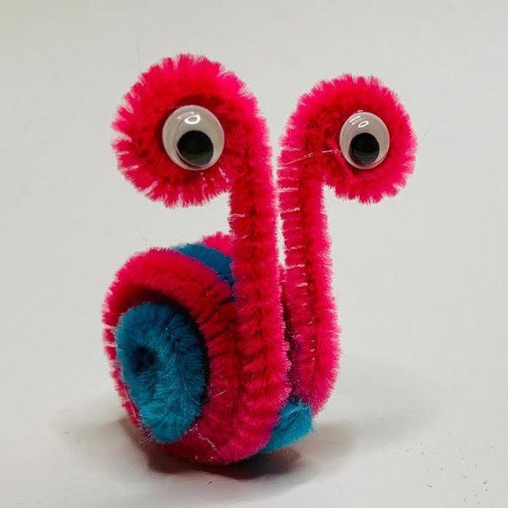Craft your own adorable snails by twisting some pipe cleaners to create a snail's spiral shell and cute little antennas. Stick on googly eyes to give your snails some personality. These fuzzy snails will crawl right into your heart with their cuteness!