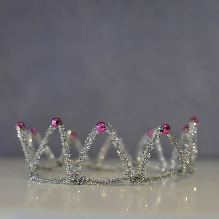 This fun-to-make pipe cleaner crown will make any wearer feel like royalty, whether they're attending a fancy ball or simply playing dress-up at home! Decorate it by adding sequins, beads, or ribbons.