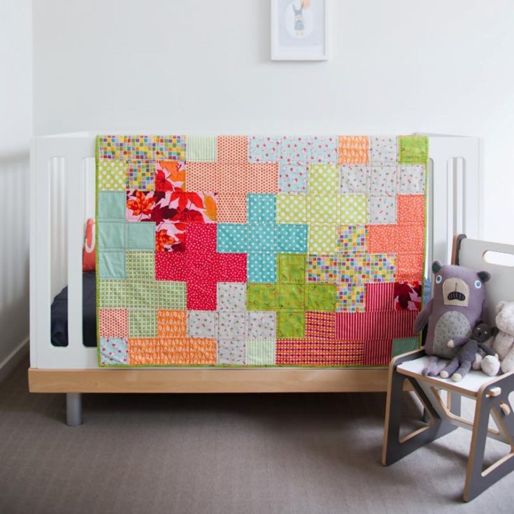 Easy quilt patterns could not be easier with this vibrant Plus Quilt pattern! This cot quilt with 38&rdquo; x 52&rdquo; dimensions would be a fantastic gift for a baby shower! It features an eye-catching design with interlocking plus signs, and this quilt blends simplicity with a touch of modern style. This pattern also provides you with three layout options to choose from.