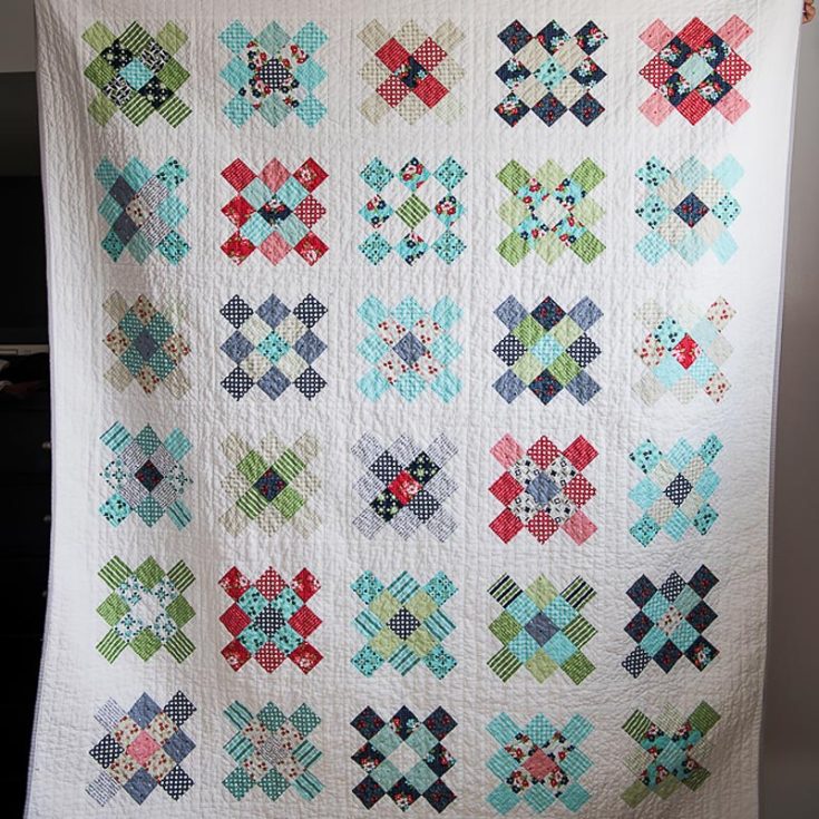 Check out the Scrappy Granny Squares Quilt design by Quilty Love. It's a simple pattern that leaves you wanting more, and you can either place your scraps in random colors or color-coordinate them for a cleaner and more aesthetic look. The finished dimensions are 60" x 70".&nbsp;