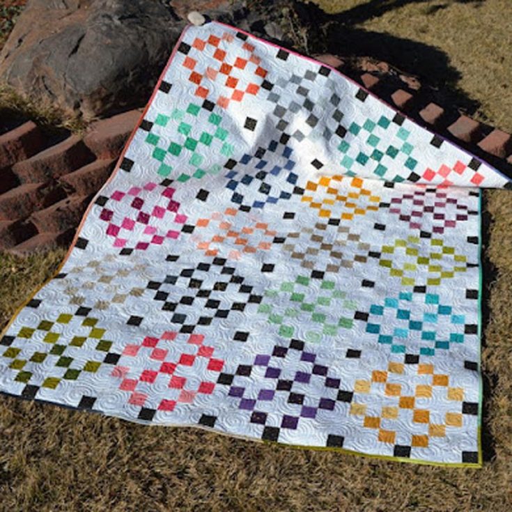 Besides quilting a throw blanket for daily use, you can also turn it into a picnic blanket! This radiant pattern by Happy Quilting Melissa will have you sewing up the sunshine and smiles in a jiffy. You can also experiment with different color placements to mix and match your jelly roll strips into a beautiful ombre design. Size: 66&rdquo; X 82&rdquo;