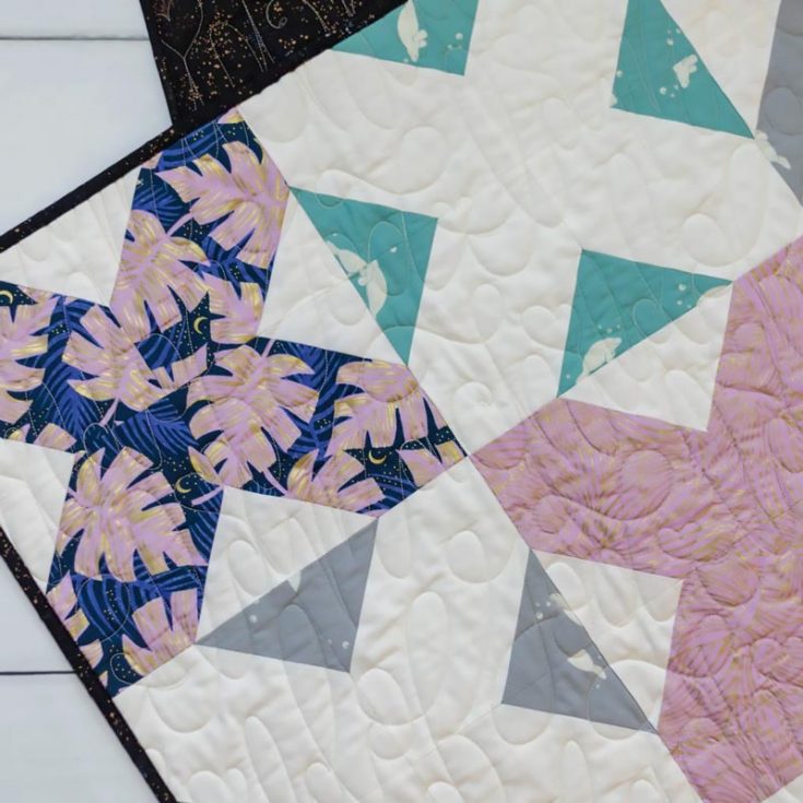 Learn to make this classic signature cross quilt pattern that is quickly sewn and is a beginner-level project! This 60" x 60" throw quilt uses repetitive signature blocks in a bold, more graphic layout with alternating prints and white 'X's. What better way to spend the weekend than to quilt this lovely piece?