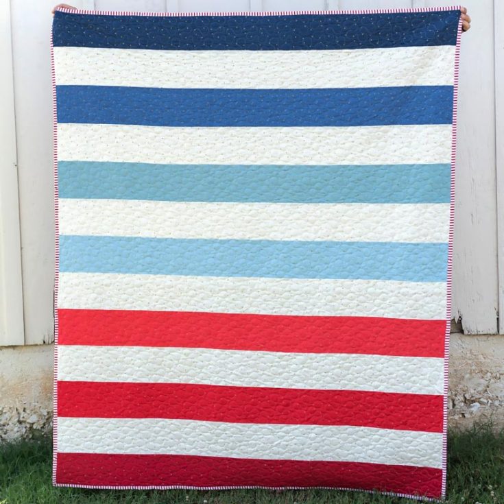 This Simple Striped Quilt is incredibly easy and straightforward to make! It&rsquo;s perfect for beginners, and the tutorial will walk you through each step, from selecting strips of fabrics to piecing together the quilt top and finishing touches. The best part about this quilt pattern is that it uses only solid colors, so there are no corners to match! The finished lap quilt size is 60&rdquo; x 72&rdquo;.
