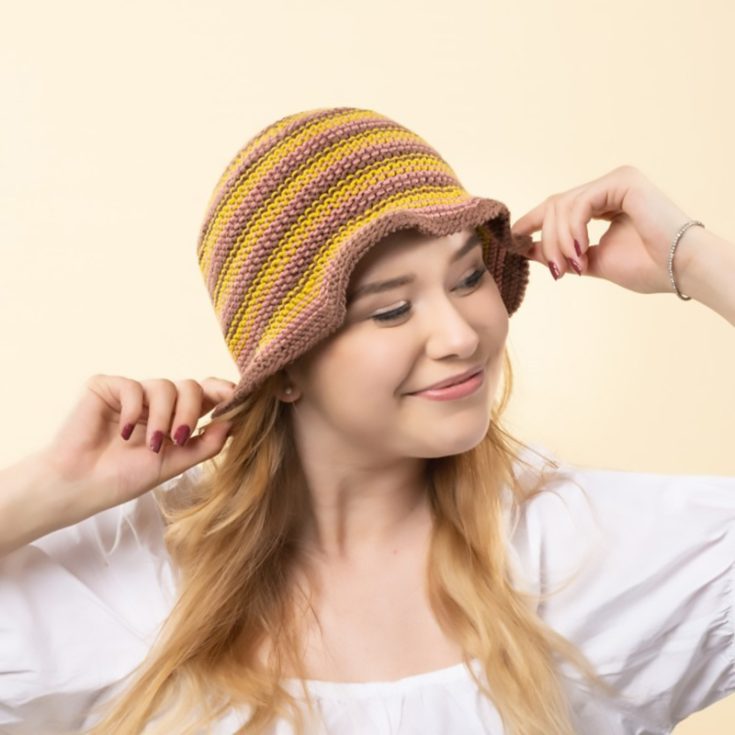 Grab your very own free knit bucket hat pattern here now! This cute design only incorporates 3 colored yarn. How simple is that? All you need to do now is download the pattern, grab your knitting supplies, grab a cup of warm cocoa, and knit away!