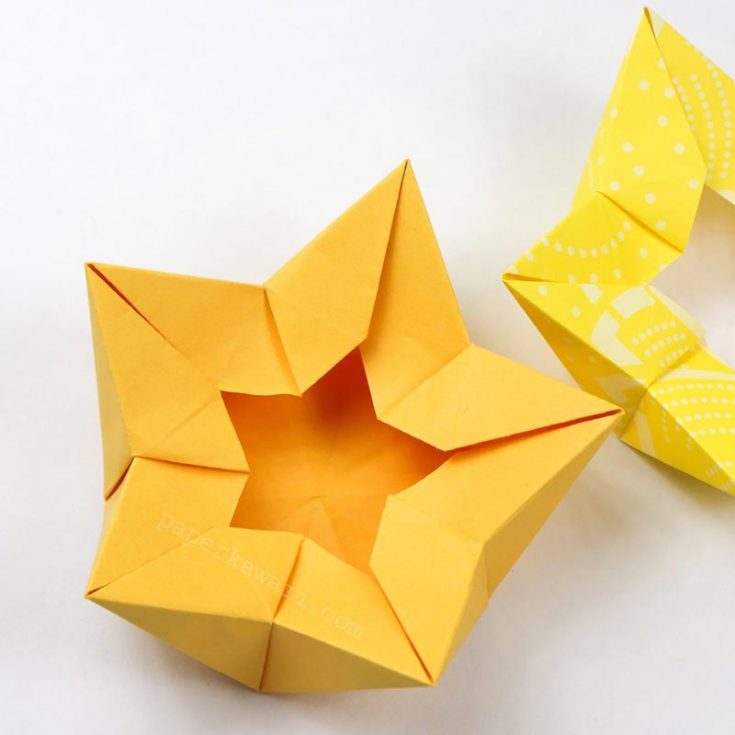 An origami box fit for kings and queens! This fabulous star crown origami box is perfect for small objects like jewelry like earrings, rings, and necklaces. Make one to put your wedding rings into before you enter the shower!