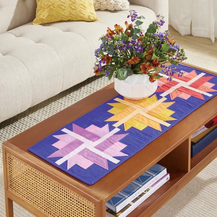 Have a look at this delightful design! Pick our four shades, each with three different colors that complement the aesthetic or decor of your home. This runner will surely add a vibrant and dashing touch to your tabletop.&nbsp; Table runner size: 14 &frac12;" x 42 &frac12;"