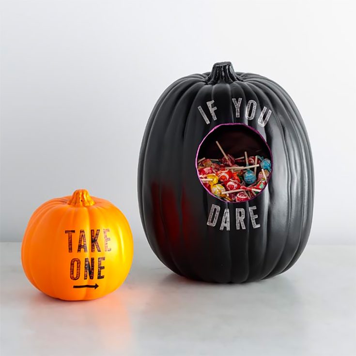 I think we can all agree that practical pumpkin painting ideas are the best ideas. This uniquely stencil pumpkin candy holder fits the bill as it can entice your trick-or-treaters to grab a piece of candy while looking pretty on your porch.
