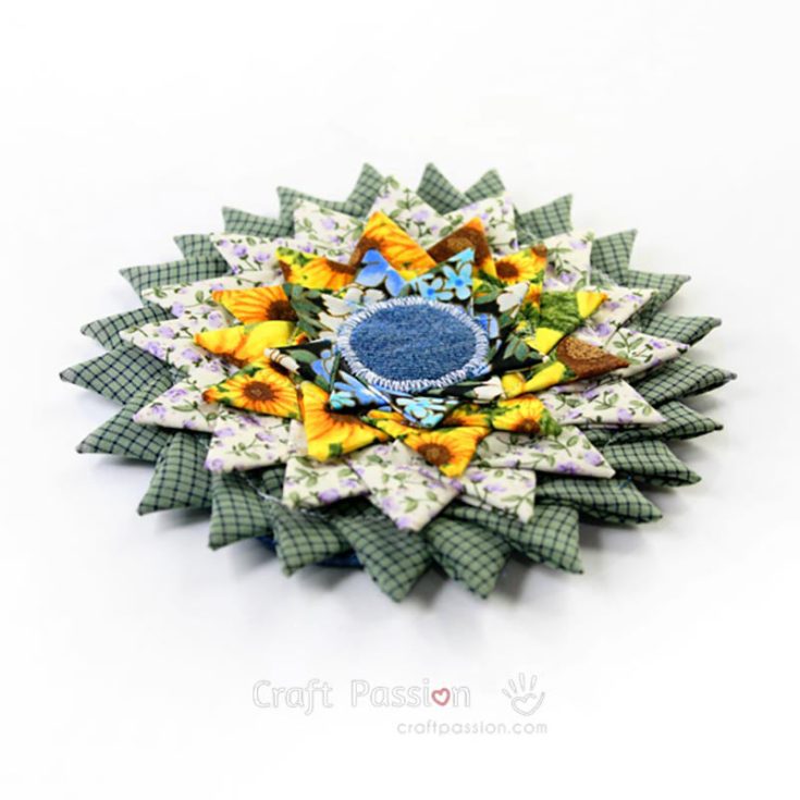 This Sunburst Triangle Fold Coaster is a fun way to add vibrancy to your table with your favorite patterns and colors. The process is simple; you will love the eye-catching and unique results. These coasters are sure to be a conversation starter at your next get-together.