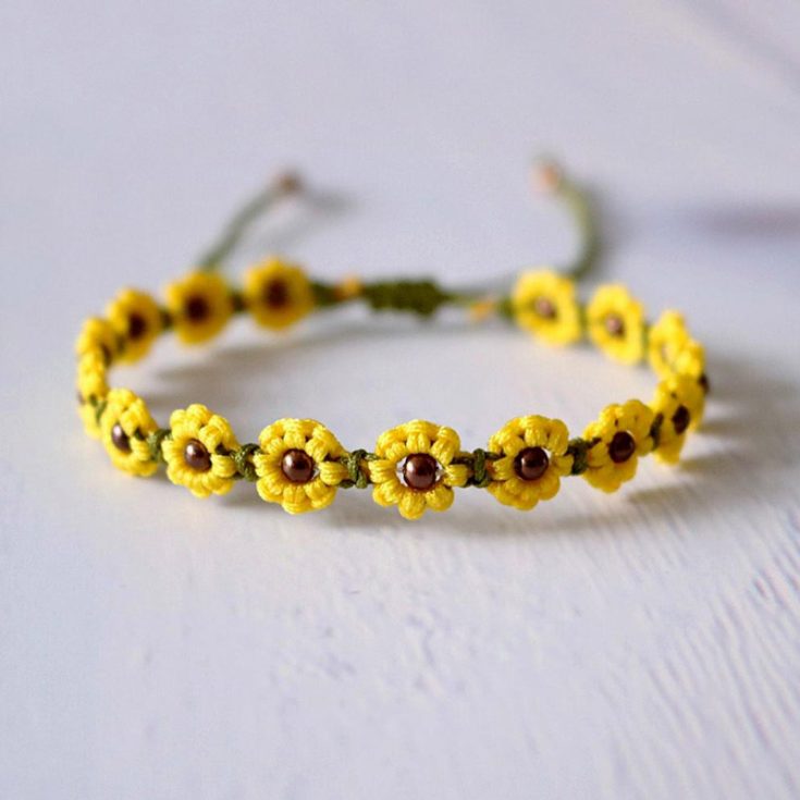 Bask in the glory of spring with these cheerful sunflower macrame bracelets! They're a beautiful accessory to showcase along with your outfits, and the best part is that you can customize the colors of the sunflower to your preferred color scheme!