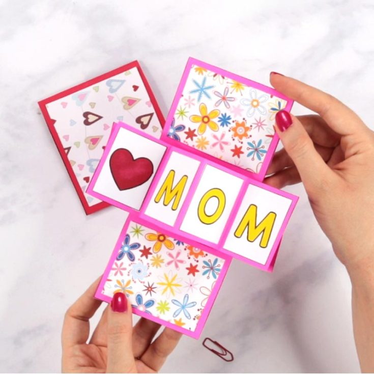 This twist and pop card offers such a different vibe to the classic wishing cards. With just a few simple folds and a sprinkle of creativity, you&rsquo;ll create a masterpiece that will make Mom&rsquo;s heart skip a beat. Customize it even more with cute doodles and decor by using colorful markers.