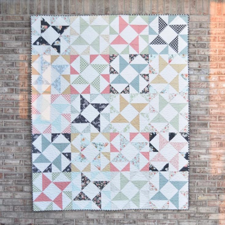 This tranquil Windmill layer cake design is so soothing to the eyes. It uses muted pastel colors and precise piecing of the half-square triangles (HSTs) to replicate a fun windmill shape! This 64&rdquo; x 80&rdquo; design is an ideal pattern for a twin-sized quilt and a delightful project for intermediate quilters.