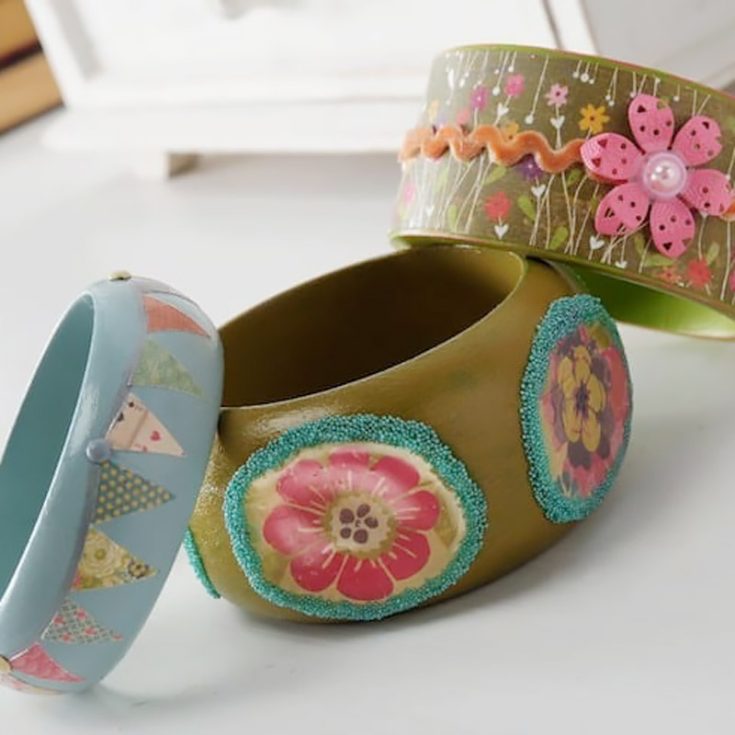 Wooden bangle bracelets offer such a fun twist when searching for bracelet ideas! With this design, you can experiment with different mediums such as paper, paint, Mod Podge, and other embellishments to make your bracelets extra personalized!